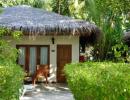 Отель Vilu Reef Beach & Spa Resort 5*. Garden villa exterior